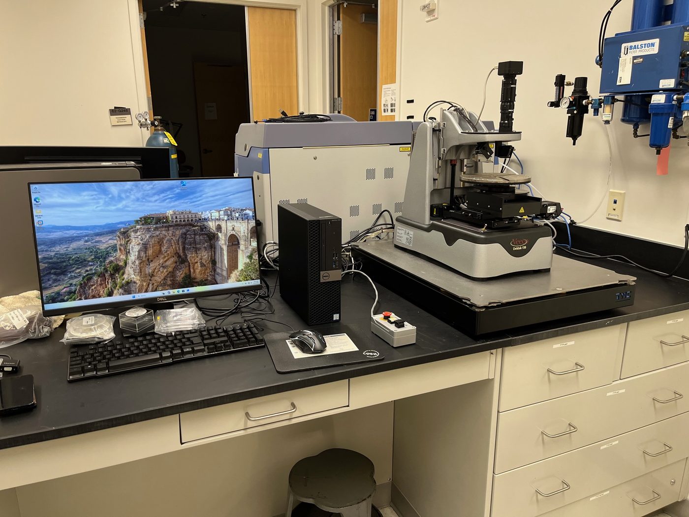 Veeco Dektak 150 stylus profiler serviced by White Glove Metrology, shown with an upgraded Windows workstation